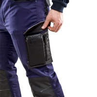 Bolsillo lateral semiflotante con pipeta reflectante con gancho para llaves, bolsillo para móvil con fuelle, bolsillos para bolígrafos.